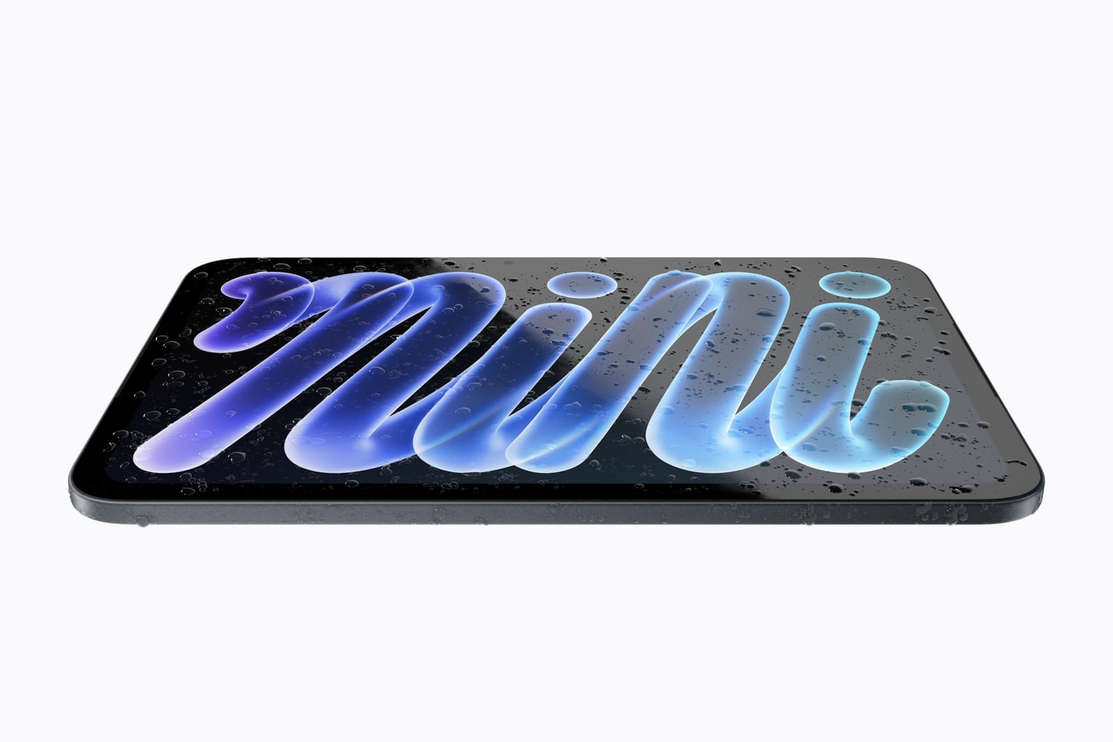The new iPad mini lies flat with water droplets on its screen and edges, its display showing blue and purple mini lettering